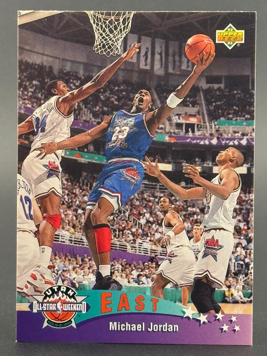 1992-93 Upper Deck Michael Jordan trading card showing him driving to the basket in an All-Star game.