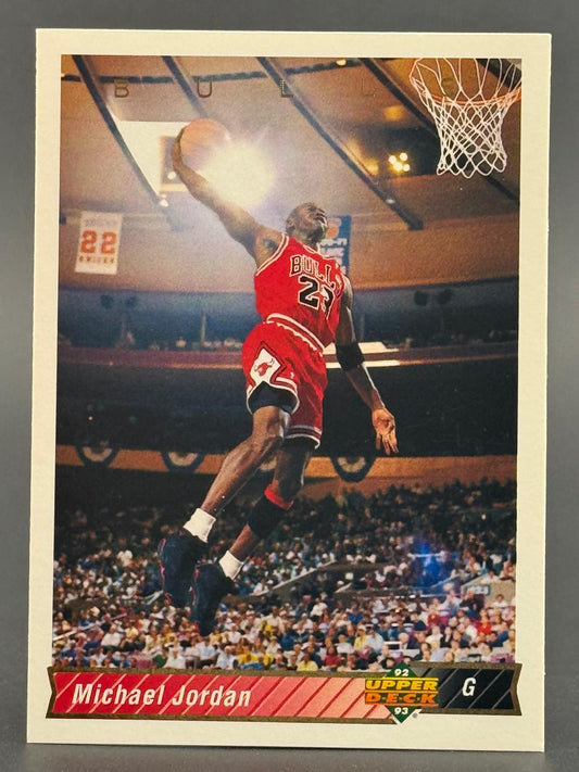 1992-93 Upper Deck Michael Jordan trading card showing Jordan dunking in a Chicago Bulls uniform.