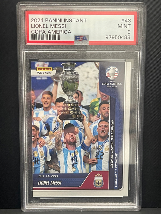 PSA 9 2024 Panini Instant Lionel Messi Copa America #43 card depicting Messi lifting trophy.